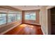 Bedroom with gleaming wood floors and windows at 545 Margaret Ct, Orlando, FL 32801