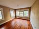 Bedroom with hardwood floors, neutral walls, and natural light at 545 Margaret Ct, Orlando, FL 32801