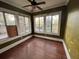 Green living room with hardwood floors and large windows at 545 Margaret Ct, Orlando, FL 32801