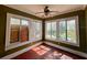 Sun-drenched room with multiple windows and hardwood floors at 545 Margaret Ct, Orlando, FL 32801