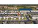 A vibrant neighborhood with a beautiful lake provides a serene backdrop for comfortable living at 7400 Oakmoss Loop, Davenport, FL 33837