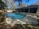 Inviting pool with concrete surround and screened-in porch, perfect for outdoor relaxation at 252 Shady Oaks Cir, Lake Mary, FL 32746