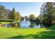 Scenic view of community pond with a fountain, surrounded by lush green landscape at 2847 Metro Sevilla Dr # 105, Orlando, FL 32835