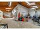 Spacious garage featuring ample storage space, wooden beams, and lots of natural light at 360 Rest Haven Rd, Geneva, FL 32732