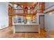 Charming kitchen with exposed-beam ceiling and a center island open to the living area at 360 Rest Haven Rd, Geneva, FL 32732