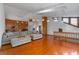 Spacious living room with a hardwood floor and built-in shelves at 360 Rest Haven Rd, Geneva, FL 32732