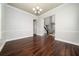 This formal dining room features hardwood flooring and a modern chandelier at 7508 Lake Albert Dr, Windermere, FL 34786