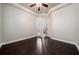 Home office featuring hardwood floors, crown molding and double doors to the foyer at 7508 Lake Albert Dr, Windermere, FL 34786