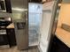 Stainless steel refrigerator with water dispenser, offering ample storage and modern convenience at 9650 Nw Gainesville Rd, Ocala, FL 34475
