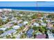 Aerial view highlighting the home's convenient location to the beach at 110 Surf St, New Smyrna Beach, FL 32169