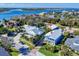 Aerial view showing a charming beach house and its proximity to the water at 110 Surf St, New Smyrna Beach, FL 32169