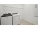 Laundry room with Whirlpool washer and dryer at 125 Citra Ln, Lake Mary, FL 32746