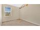 Cozy bedroom with a window, neutral carpet and a planetary decorative theme at 514 Rainbow Springs Loop, Groveland, FL 34736