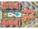 Complex pool and courtyard with surrounding condo buildings at 5512 Metrowest Blvd # 110, Orlando, FL 32811