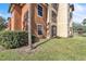 Building exterior showcasing landscaping and building features at 5512 Metrowest Blvd # 110, Orlando, FL 32811