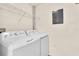 Laundry room with washer and dryer, and shelving at 5512 Metrowest Blvd # 110, Orlando, FL 32811