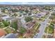 Wide aerial view of the house and surrounding neighborhood at 6621 Bouganvillea Crescent Dr, Orlando, FL 32809