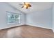 Spacious bedroom with light blue walls and wood-look floors at 6621 Bouganvillea Crescent Dr, Orlando, FL 32809