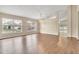 Bright and airy living room with wood-look floors at 6621 Bouganvillea Crescent Dr, Orlando, FL 32809