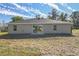 Newly built home with a large backyard and sliding glass doors at 258 Fraser Rd, Debary, FL 32713