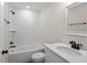 Clean bathroom with white subway tiles, a bathtub, and a quartz vanity at 258 Fraser Rd, Debary, FL 32713