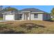 Newly built single-story home with gray siding and a gray roof at 258 Fraser Rd, Debary, FL 32713