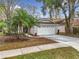 Charming single-story home featuring a well-maintained front yard and a two-car garage at 1945 Piedmont Park Blvd, Apopka, FL 32703
