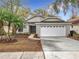 Charming single-story home featuring a well-maintained front yard and a two-car garage at 1945 Piedmont Park Blvd, Apopka, FL 32703