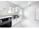Modern kitchen with white cabinets, a stainless steel farmhouse sink, and contemporary fixtures at 1945 Piedmont Park Blvd, Apopka, FL 32703