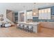 Spacious kitchen featuring an island with seating and views of the living area at 1948 Rowena Ave, Orlando, FL 32803