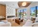 Modern living room with large windows overlooking the pool and backyard at 1948 Rowena Ave, Orlando, FL 32803
