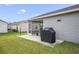 The back patio is perfect for grilling at 4694 Monica St, The Villages, FL 32163