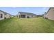 This home features a large back yard at 4694 Monica St, The Villages, FL 32163