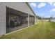 Entertain friends on the screened in back porch at 4694 Monica St, The Villages, FL 32163