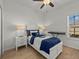 ' bedroom with twin bed, music keyboard, and crisp white walls and trim at 489 Avila Pl, Howey In The Hills, FL 34737