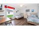 Bedroom with two twin beds, a desk area, and cheerful decorations at 577 Sunridge Woods Blvd, Davenport, FL 33837