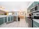 Updated kitchen with modern appliances, stainless steel dishwasher and stove at 577 Sunridge Woods Blvd, Davenport, FL 33837