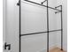 A simple closet system with black metal rods against white walls and light wood flooring at 12009 Sw 61St Place Road, Ocala, FL 34481