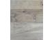 Close-up of the stylish and natural wood flooring throughout the home at 12009 Sw 61St Place Road, Ocala, FL 34481