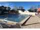 Rectangular community pool with safety cover at 3009 Manatee Rd, Tavares, FL 32778