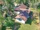 Aerial view showing house, large backyard, and detached structure at 8009 Applehill Ct, Orlando, FL 32810