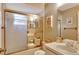 Clean bathroom with shower/tub combo and decorative accents at 8009 Applehill Ct, Orlando, FL 32810