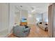 Bright living room with hardwood floors and comfy seating at 8009 Applehill Ct, Orlando, FL 32810