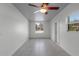 Spacious bonus room with tile floors and ceiling fan at 2313 Savoy Dr, Orlando, FL 32808