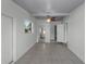 Bonus room with tile floor, ceiling fan, and access to other areas at 2313 Savoy Dr, Orlando, FL 32808