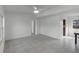 Bright living room with tile floors and access to other rooms at 2313 Savoy Dr, Orlando, FL 32808