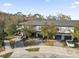 Aerial view of townhomes showing well-maintained exteriors, landscaped yards, and convenient parking in a desirable neighborhood at 4457 Le Reve Ct, Kissimmee, FL 34746