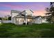 Expansive backyard with lush green grass, patio area, perfect for outdoor living and entertaining at 777 Halifax Ave, Winter Park, FL 32792