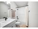 Well-lit bathroom featuring a combination tub and shower with matte black hardware and a light grey color palette at 777 Halifax Ave, Winter Park, FL 32792