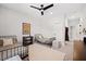 Spare bedroom showcasing matching twin beds and a neutral color scheme, complete with a ceiling fan at 777 Halifax Ave, Winter Park, FL 32792